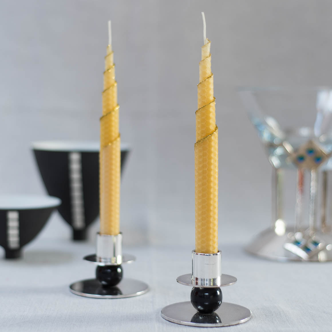 beeswax dinner candle pair, handrolled with fine glittered spiral edge
